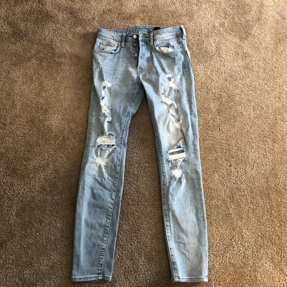 Light Washed Ripped Jeans - Picture 2 of 4